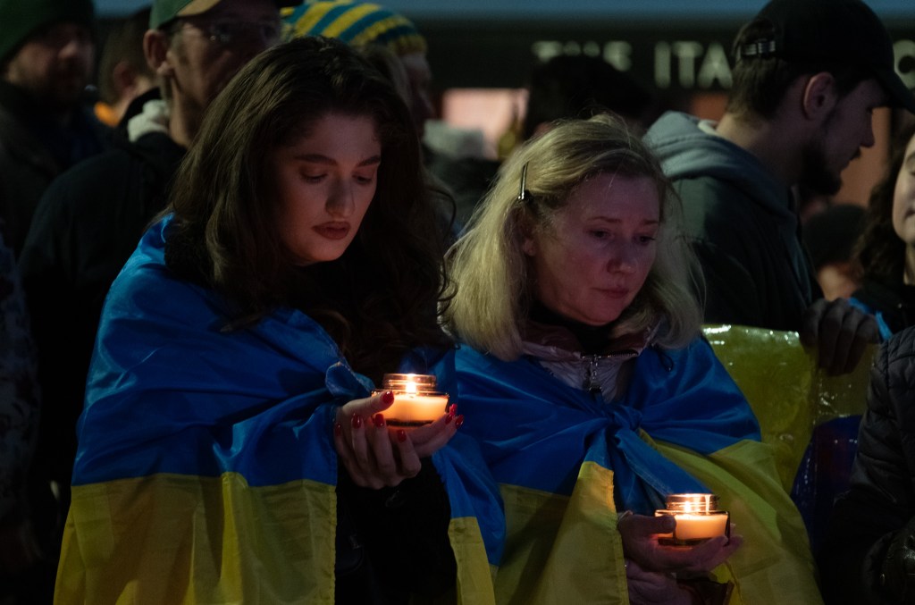 Vigil, march and rally held in Nottingham to mark one year of full-scale invasion of&nbsp;Ukraine